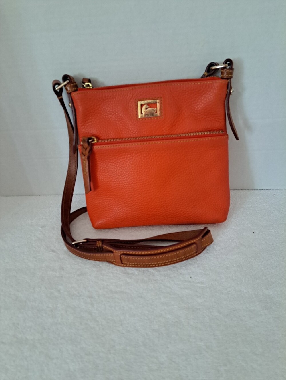 Dooney & Bourke Tangerine Pebble Leather Crossbody with Caramel Leather Strap